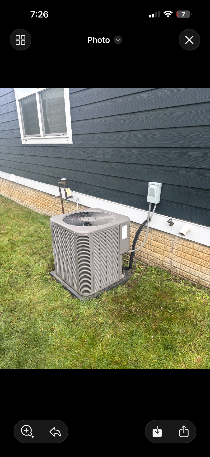 Outdoor residential condenser — finished installation