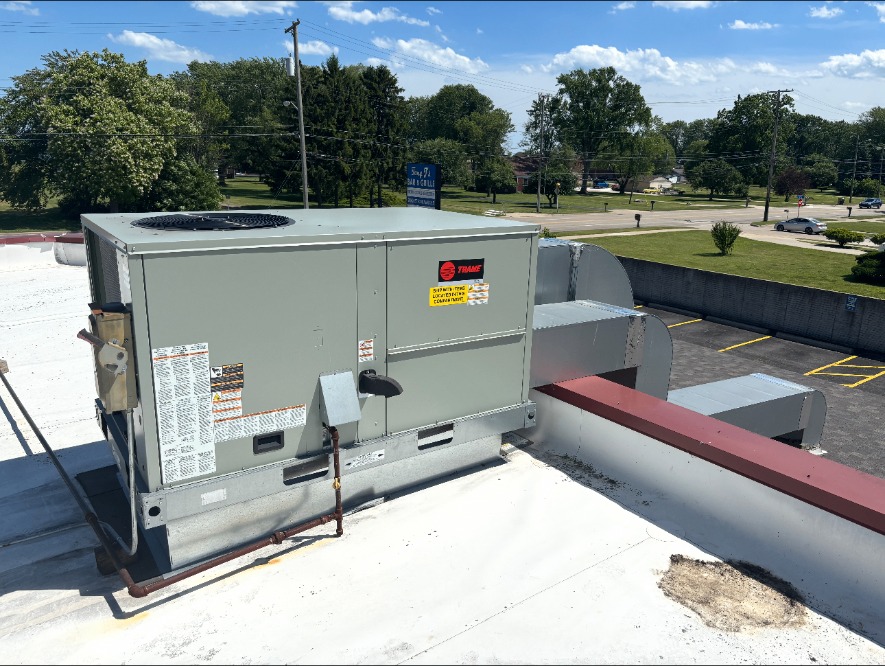 Commercial rooftop unit — side view with ductwork